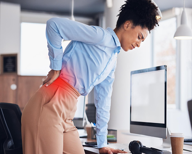 Physical therapist providing sciatica treatment and nerve pain relief